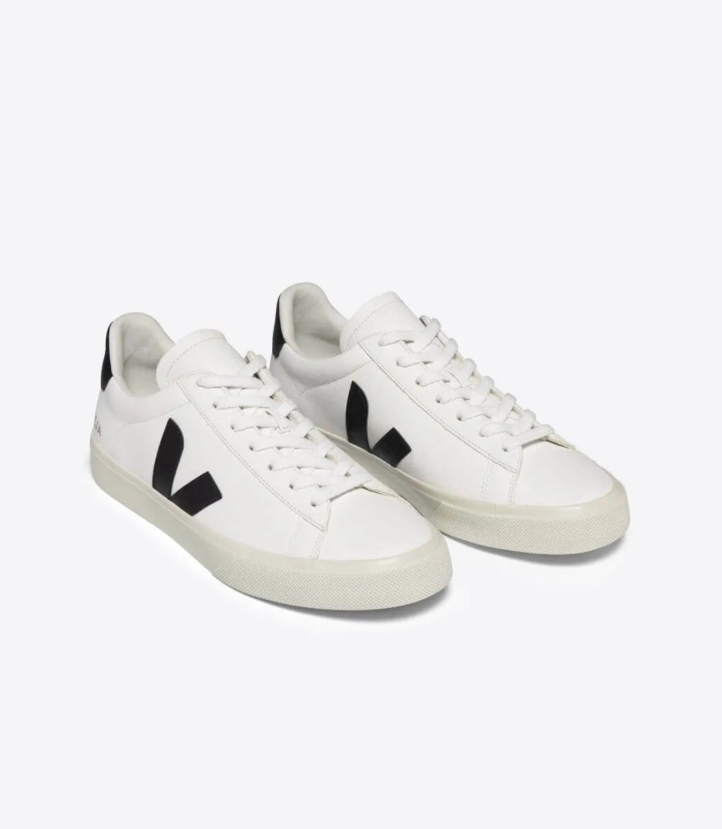 White Veja Campo sneakers with black V logo and lace-up design from JP SUS